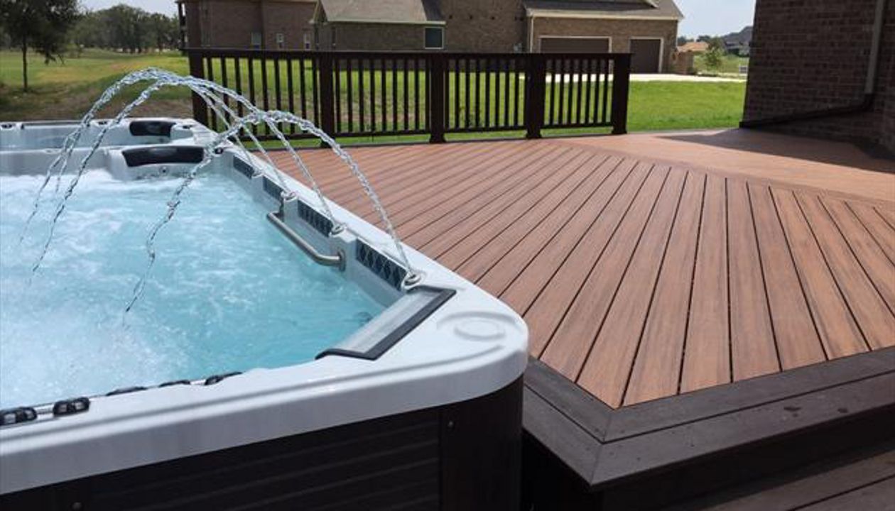 Tiki Torch Deck with Vintage Lantern Railing and Swim Spa 1