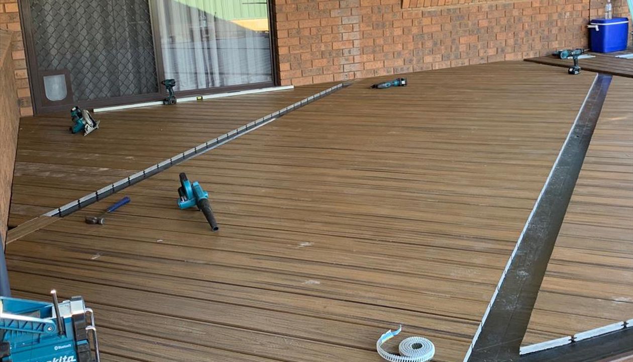 The new deck under construction. The owners chose Havana Gold for the main deck with Lava Rock fascia