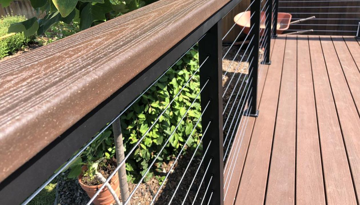 Tiki Torch Trex Transcend with stainless steel cable railing Trex cocktail rail Atascadero