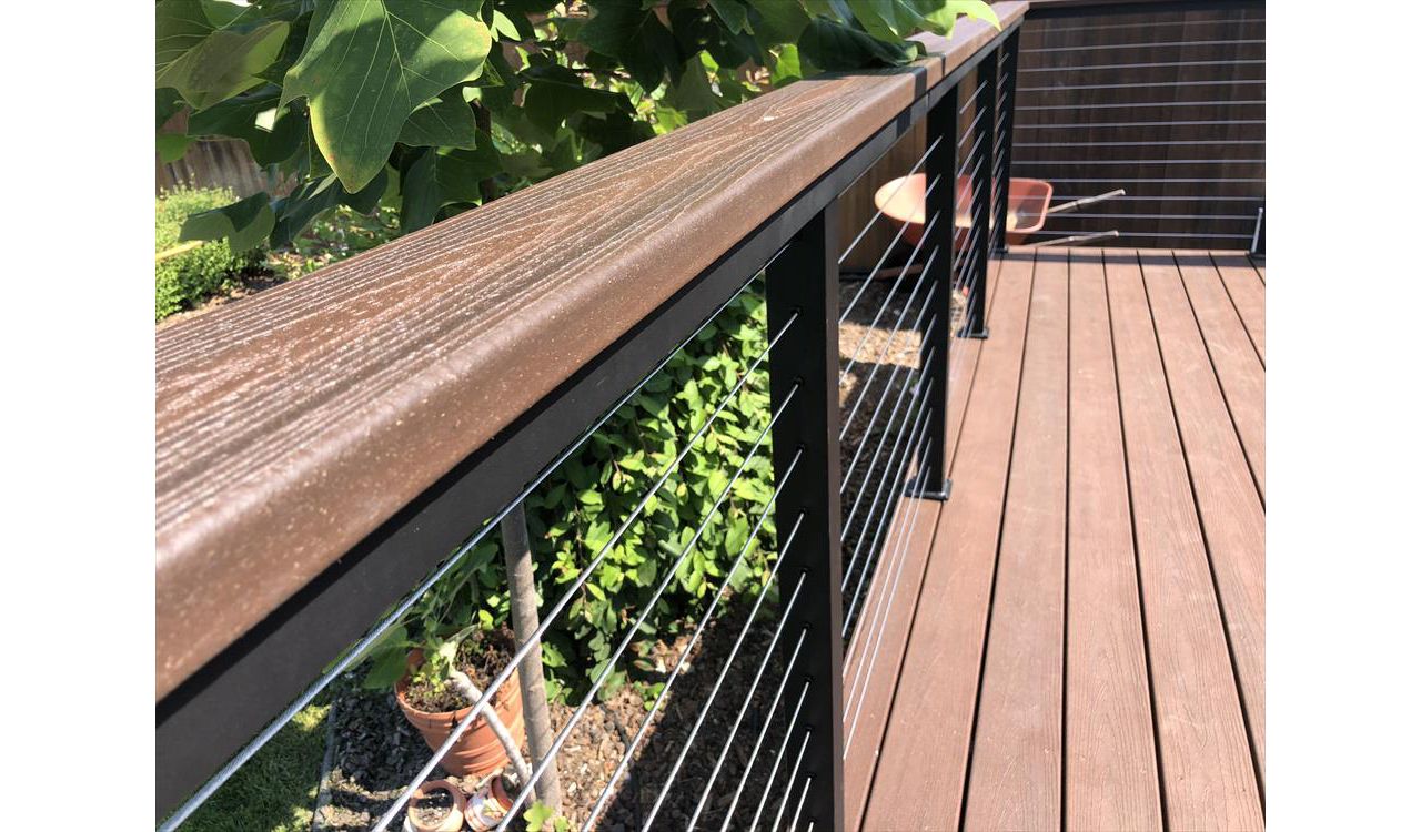Tiki Torch Trex Transcend with stainless steel cable railing Trex cocktail rail Atascadero