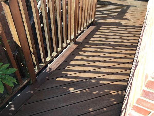 leaving existing railing and re-laying new Trex boards over existing sub-frame.