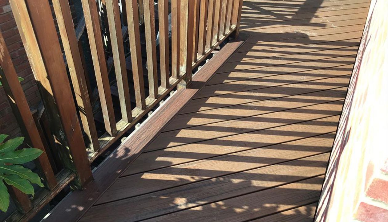 leaving existing railing and re-laying new Trex boards over existing sub-frame.