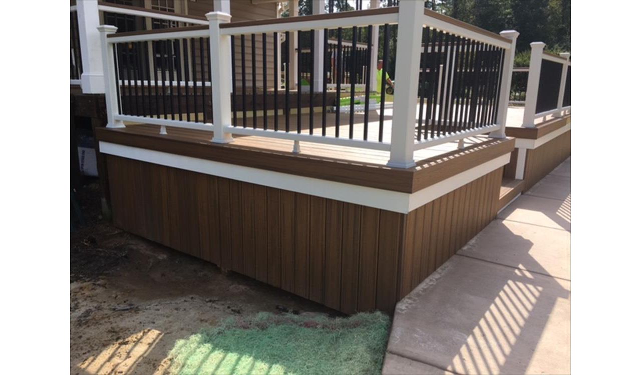 Incredible Trex Transcend Havana Gold deck with Transcend Classic White rails in Lillington, NC