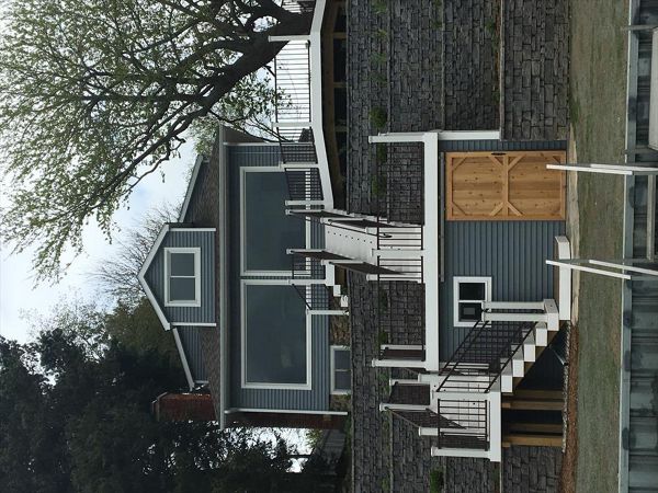 Trex Transcend Spiced Rum decking with Trex Signature Railing and Classic White Transcend post sleeves