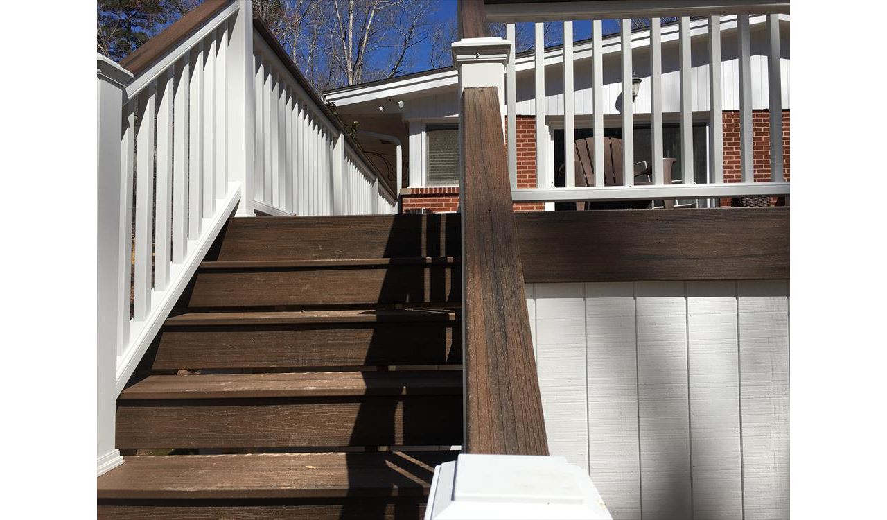Trex Transcend Spiced Rum 2x4 handrail cap provides a safe rail to grasp when arriving at the party