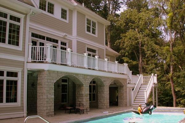 Trex Transcend Spiced Rum & Lava Rock deck with planters, seating & relaxing areas Advance, NC.
