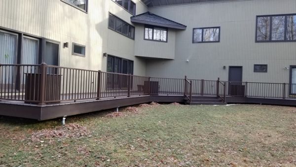 Trex select woodland brown decking and trex signature bronze railing with 3 bronze gates
