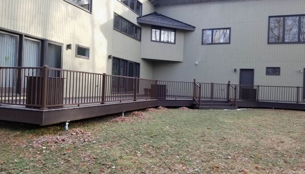 Trex select woodland brown decking and trex signature bronze railing with 3 bronze gates