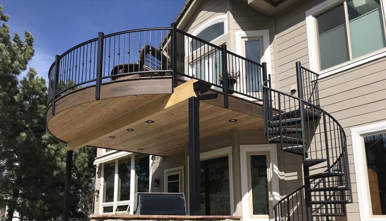 Spiced Rum decking and fascia, Rain Escapes, custom spiral stairs and rail