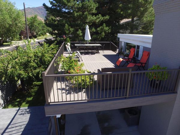 clam shell deck with trex rainescape and soffit underlay for rv parking