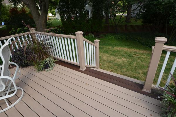 Trex Transcend Rope Swing Decking and Railing with Lava Rock Border -