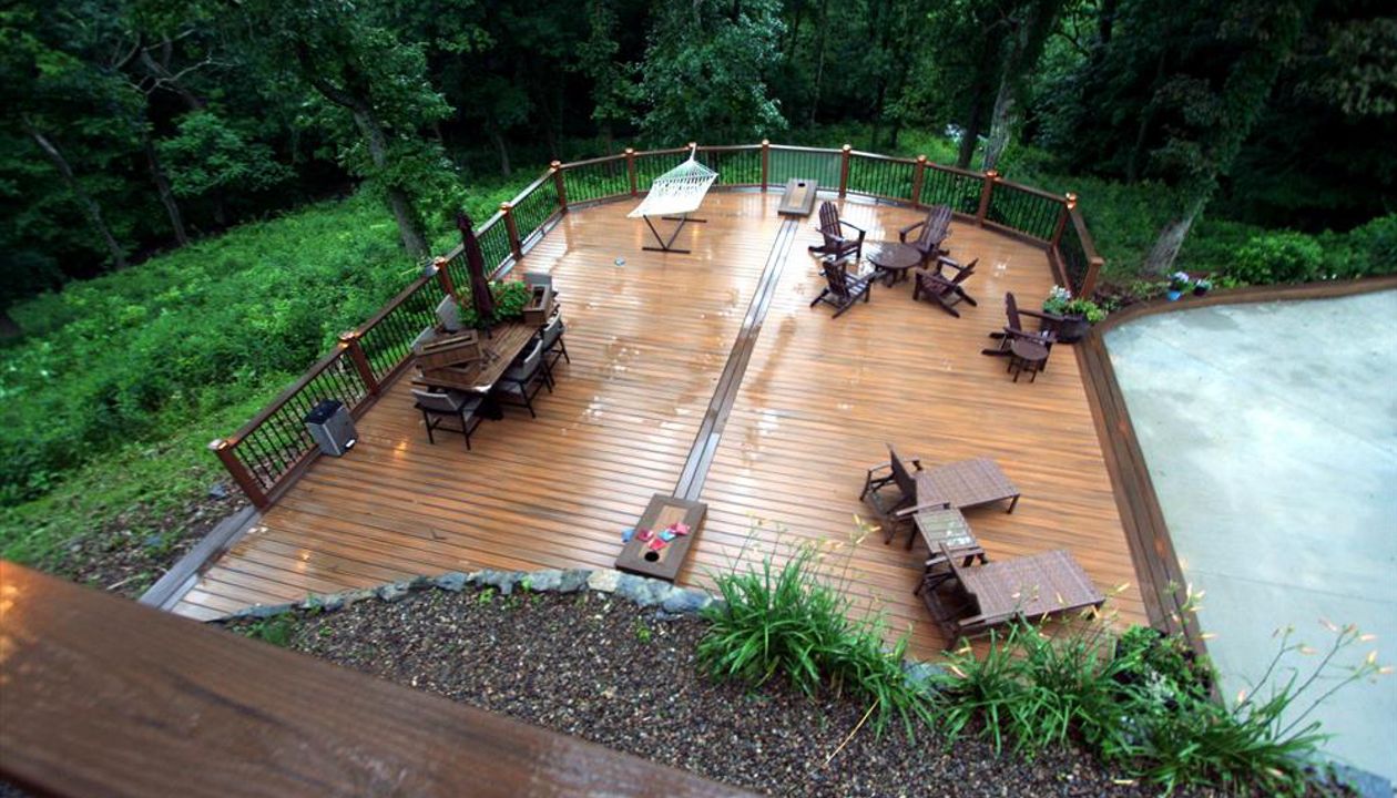 Havana Gold with spiced rum border. Tiki torch rail with black round balusters.