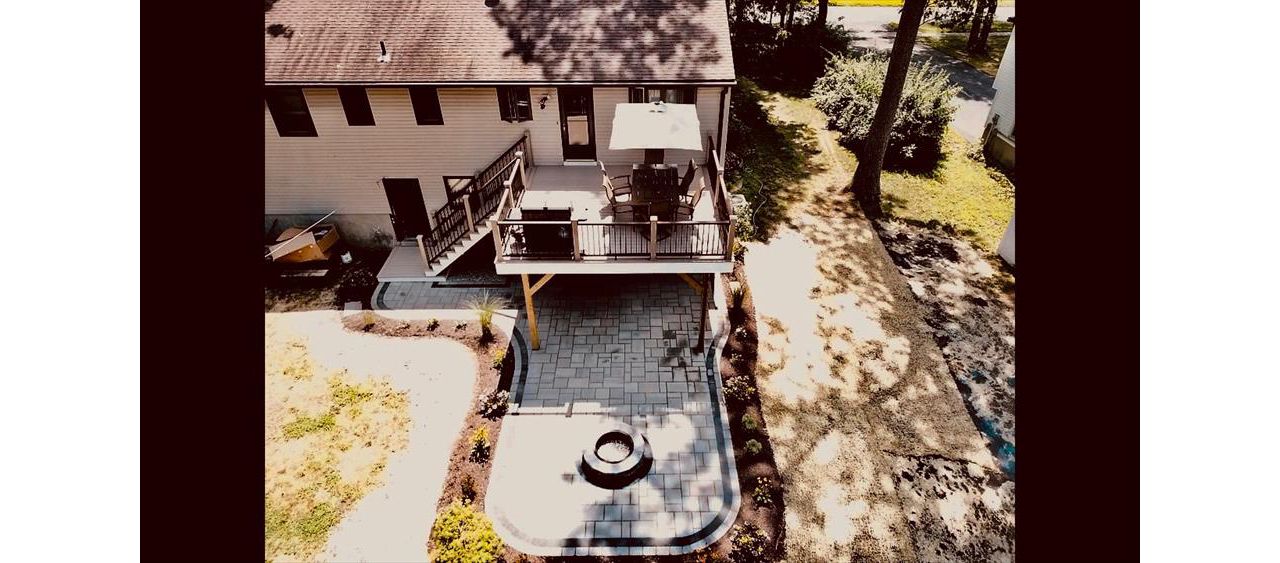 Trex Rope Swing with Vintage Lantern Horizontal Top/Bottom Rails and Rain Escapes system to create dry patio space below