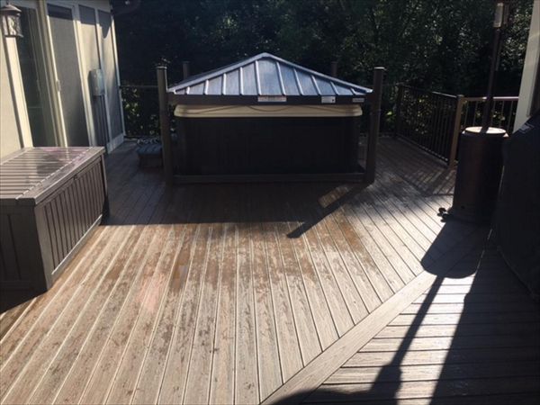 Trex Transcend Spiced Rum Porch provides safe & slip resistant walking surface around this hot tub area.