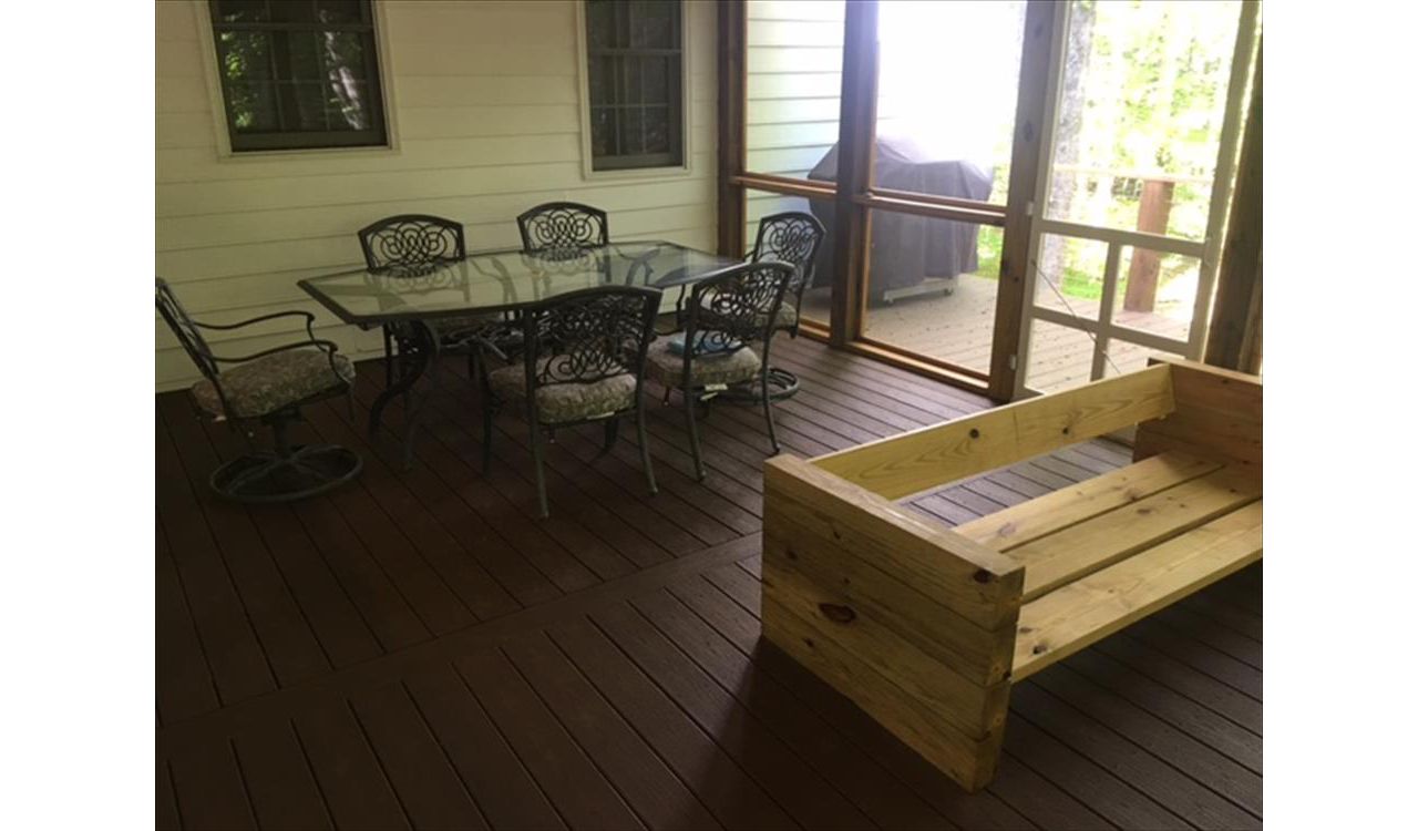 Trex Saddle Enhance porch area is great respite from the work week or a scortching summer day