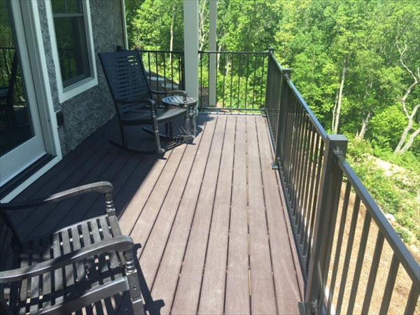 Smaller Trex Select Woodland Brown decks give the homeowners great areas to entertain and see the wonderful views