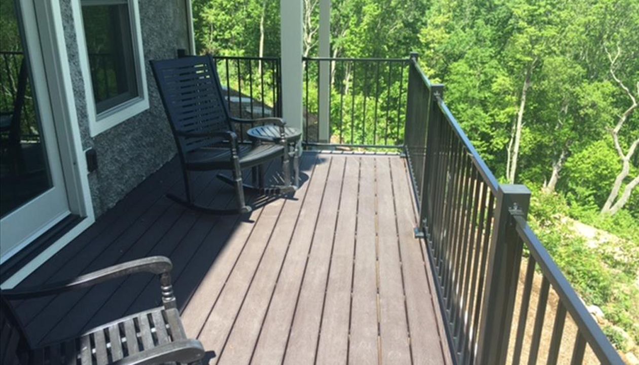 Smaller Trex Select Woodland Brown decks give the homeowners great areas to entertain and see the wonderful views