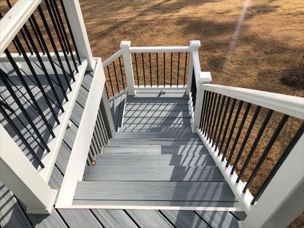 Trex Enhance Naturals Foggy Wharf landing with Transcend white railing is great, code compliant transition to the backyard.