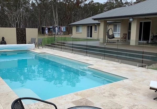 Lovely view of the deck from across the pool