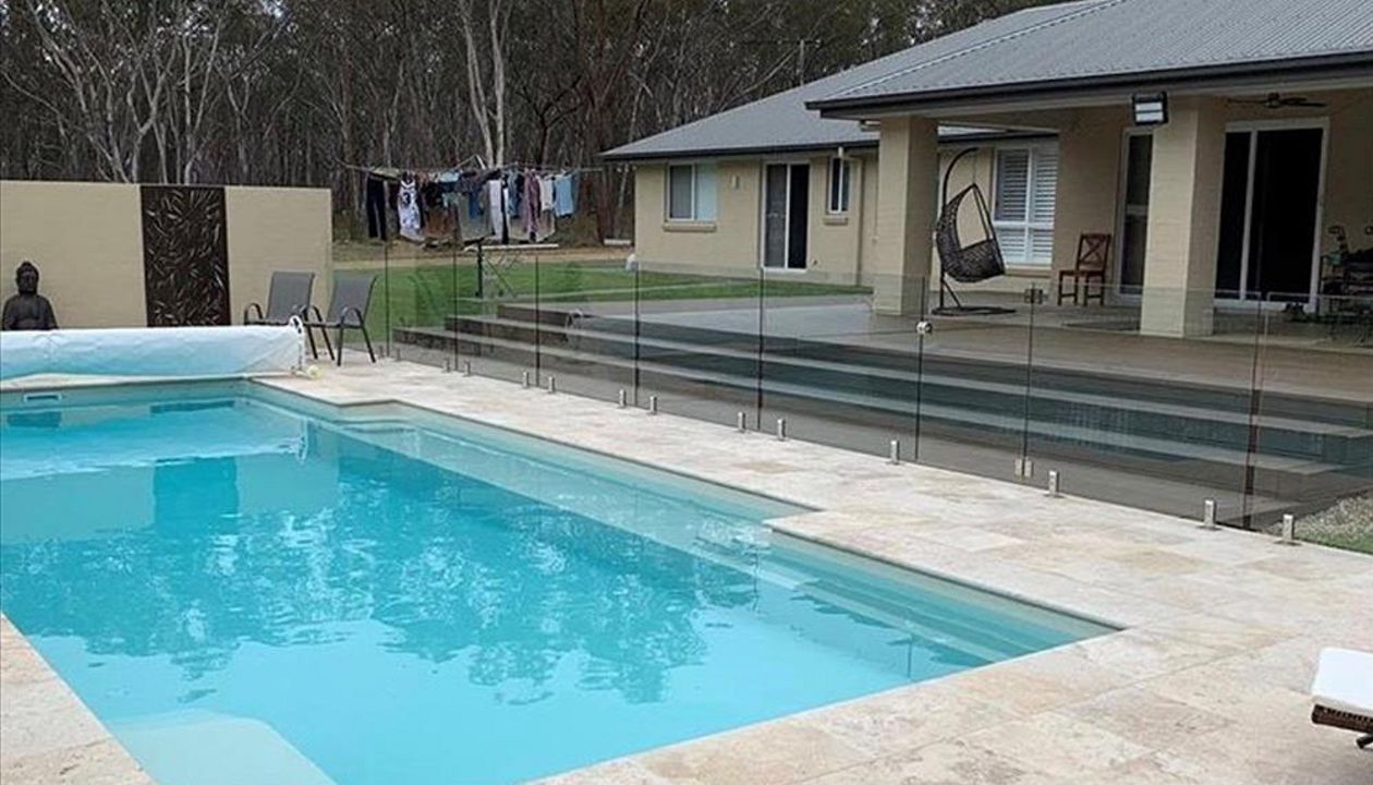 Lovely view of the deck from across the pool