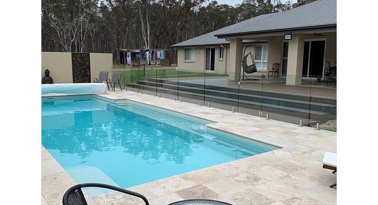 Lovely view of the deck from across the pool