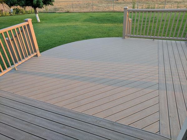 Custom Trex Rope Swing curved deck in Redding CA with Trex Transcend railing and multiple stairways. Majestic Builders is proud to provide top quality composite decks that will last a lifetime.