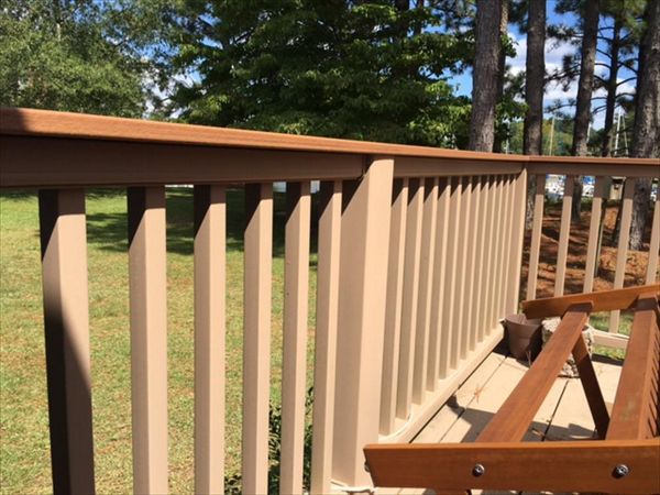 Trex Transcend Rope Swing railing with a Havana Gold cocktail railing cap is both functional & beautiful.