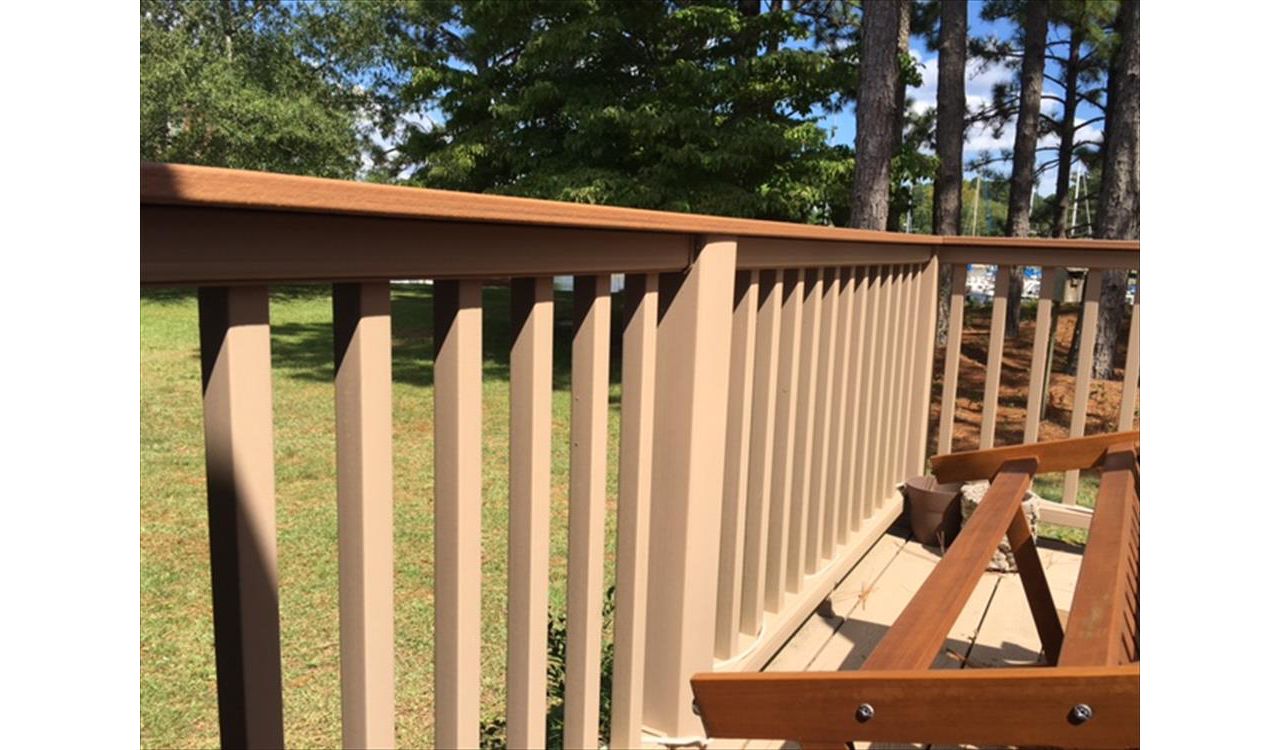 Trex Transcend Rope Swing railing with a Havana Gold cocktail railing cap is both functional & beautiful.