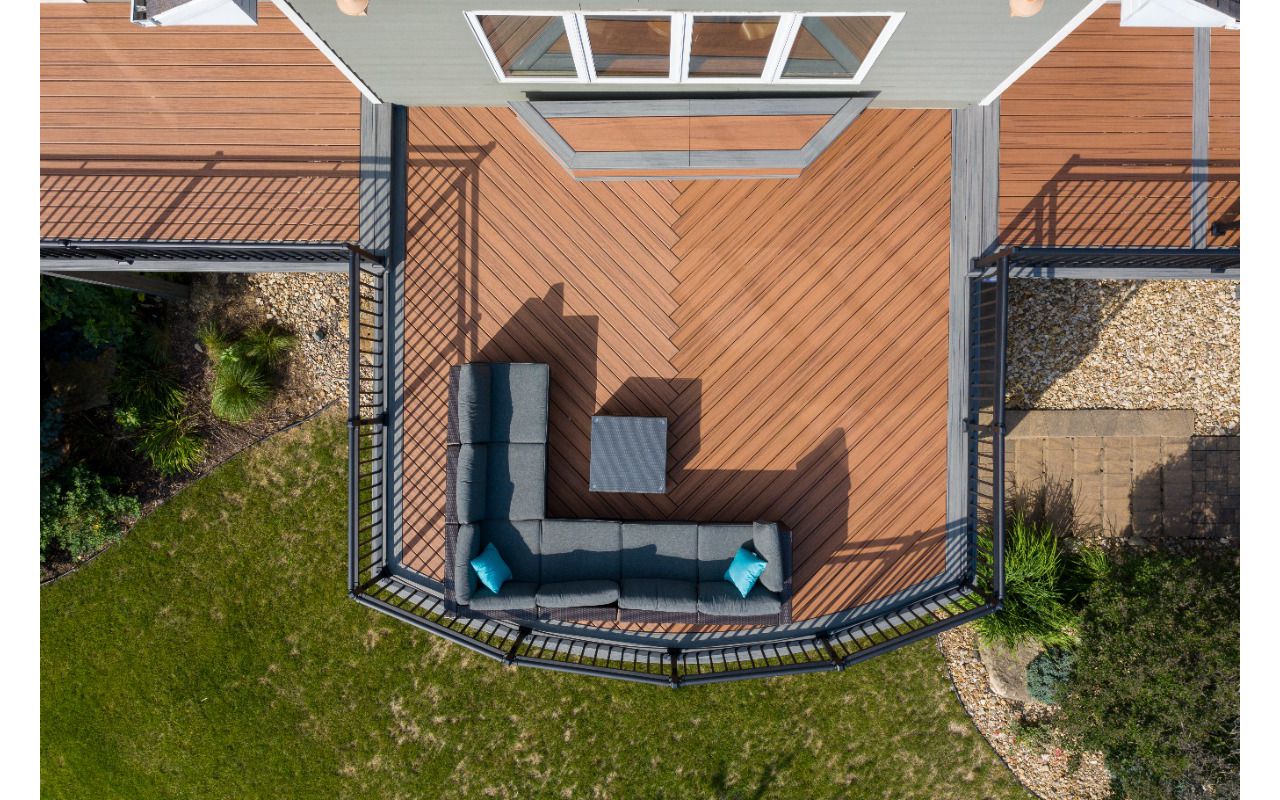 Trex Tiki Torch with Island Mist double border, angled decking