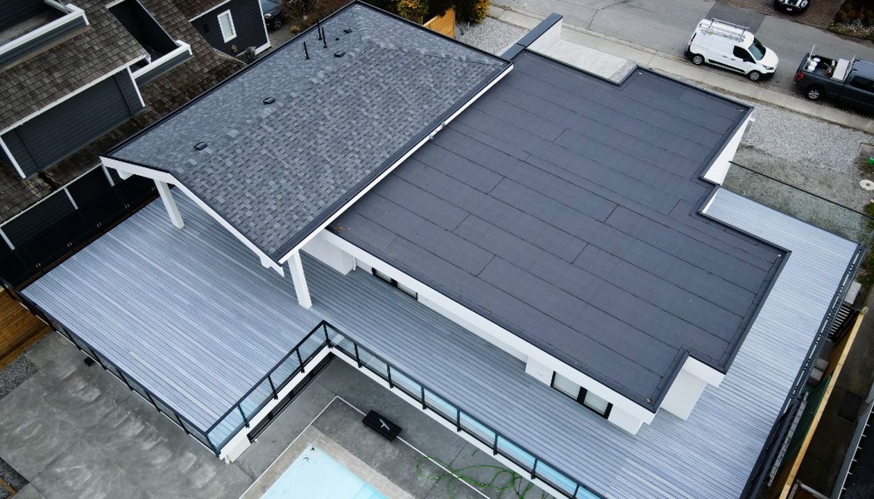 Foggy Wharf field. This rooftop deck floats on a sleeper system above granular torch down membrane allowing the roof system to work exactly as intended while provided a massive amount of usable deck space.