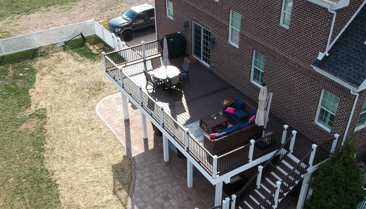 550sq ft Spiced Rum deck with Vintage Lantern rails and picture frame