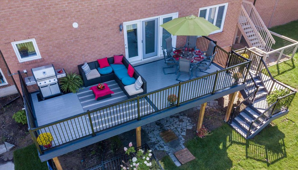 Grey Composite Decking using Select Pebble Grey with Winchester Grey trim - Orangeville, Caledon, Alliston, Bolton