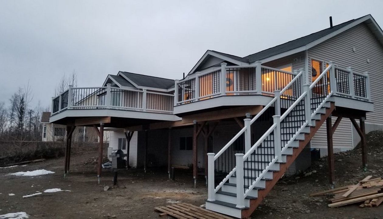 Trex select winchester grey decking with trex transcends white railings and trex white fascia boards