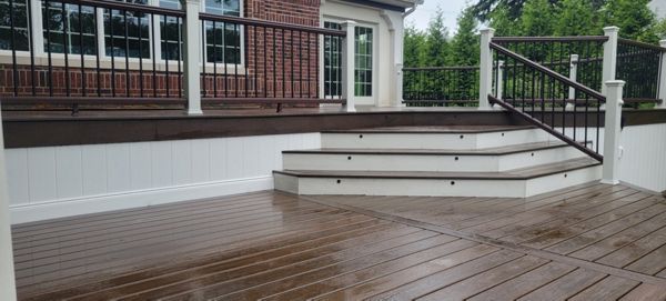 Trex Transcend Spiced Rum deck with composite rail for water front deck upgrade in Harrison Township, MI