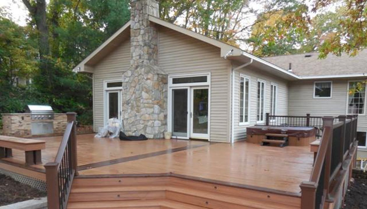 Dix Hills Trex Splayed stairs with built in Hot tub