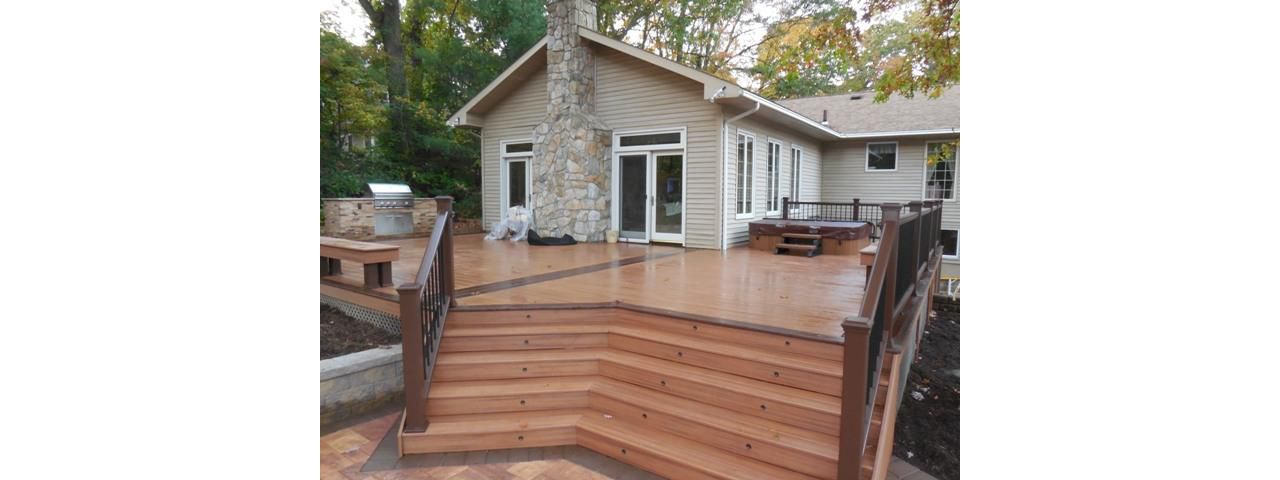 Dix Hills Trex Splayed stairs with built in Hot tub