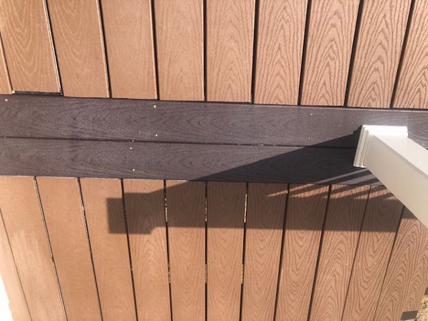 Trex Select Woodland Brown feature boards highlight the Saddle Select decking