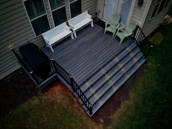 Awesome Signature railings with post cap and riser lights!