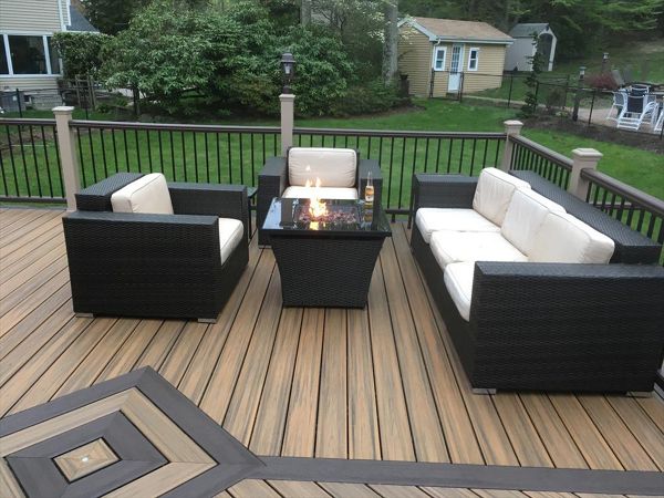Lounging by the fire pit on a beautiful Trex deck
