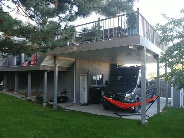 clam shell deck with trex rainescape and soffit underlay for rv parking