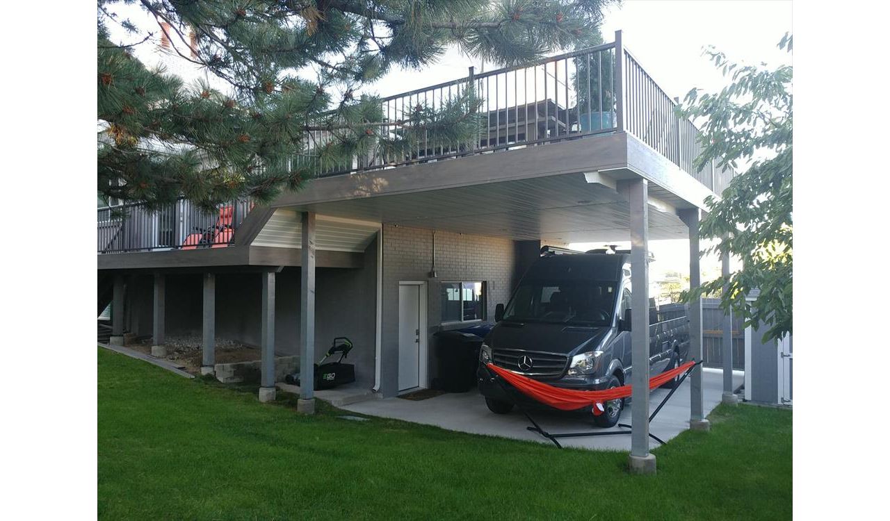 clam shell deck with trex rainescape and soffit underlay for rv parking