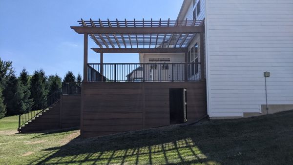 Trex Transcend Havana Gold with hidden doors in skirting.