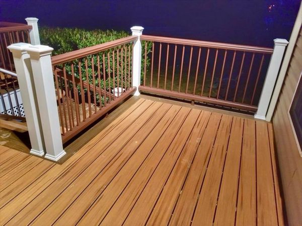 Trex Transcend Tiki Torch Decking and Vintage Lantern Transcend Railing