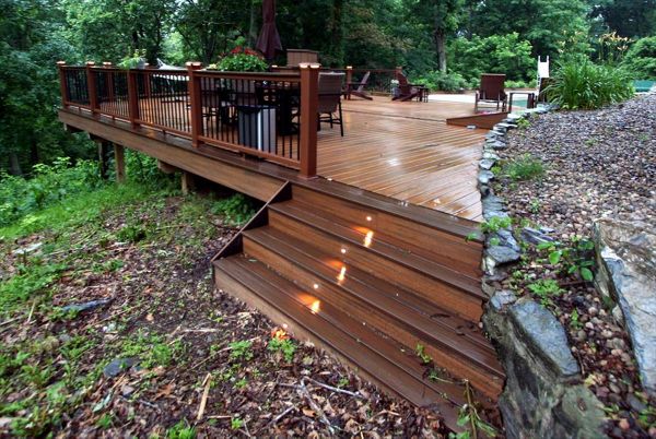 Havana Gold with spiced rum border. Tiki torch rail with black round balusters.