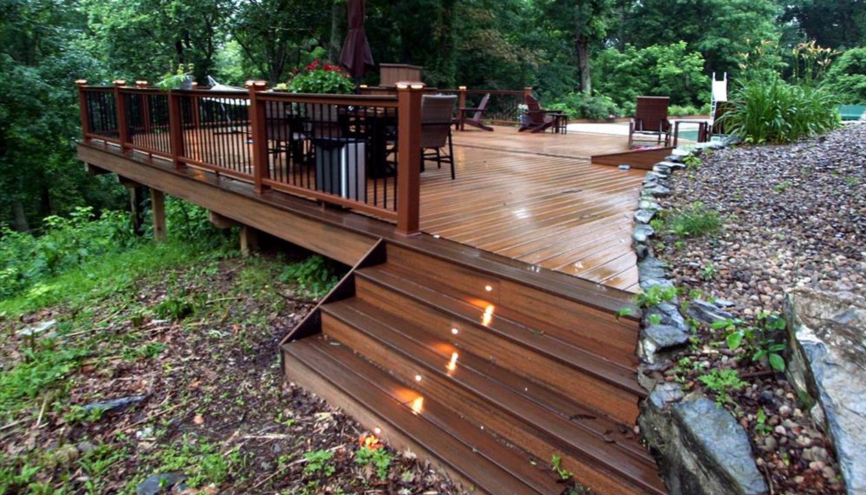 Havana Gold with spiced rum border. Tiki torch rail with black round balusters.