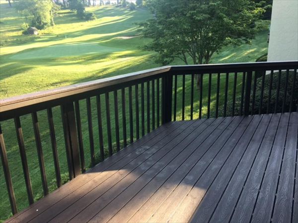The Trex Transcend Vintage Lantern decking goes well with the painted wood railings & had no issue with HOA approval.