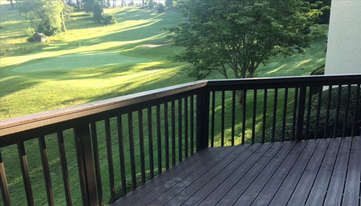 The Trex Transcend Vintage Lantern decking goes well with the painted wood railings & had no issue with HOA approval.