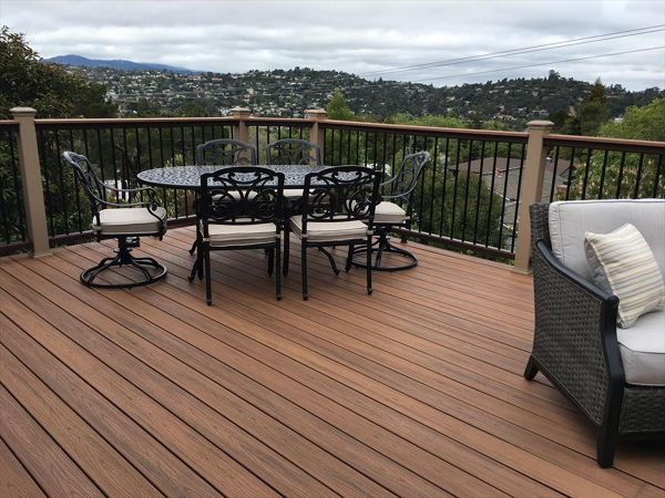 San Carlos, CA -Trex Transcends Tiki Torch with Rope Swing Posts, Vintage Lantern rail and Black round Balusters