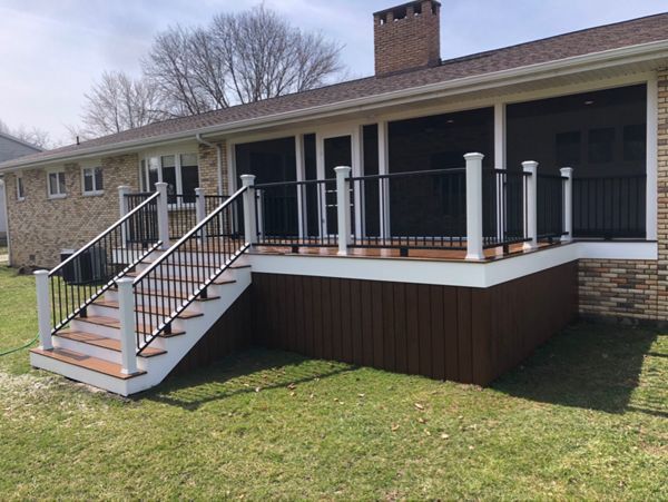 Trex saddle, custom railings and versatex