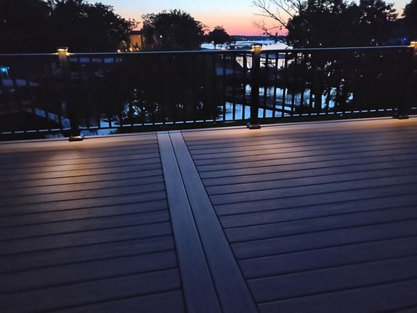 Trex Island Mist decking, Black aluminum railing with low voltage LED post lights done in Lake Ozark, MO